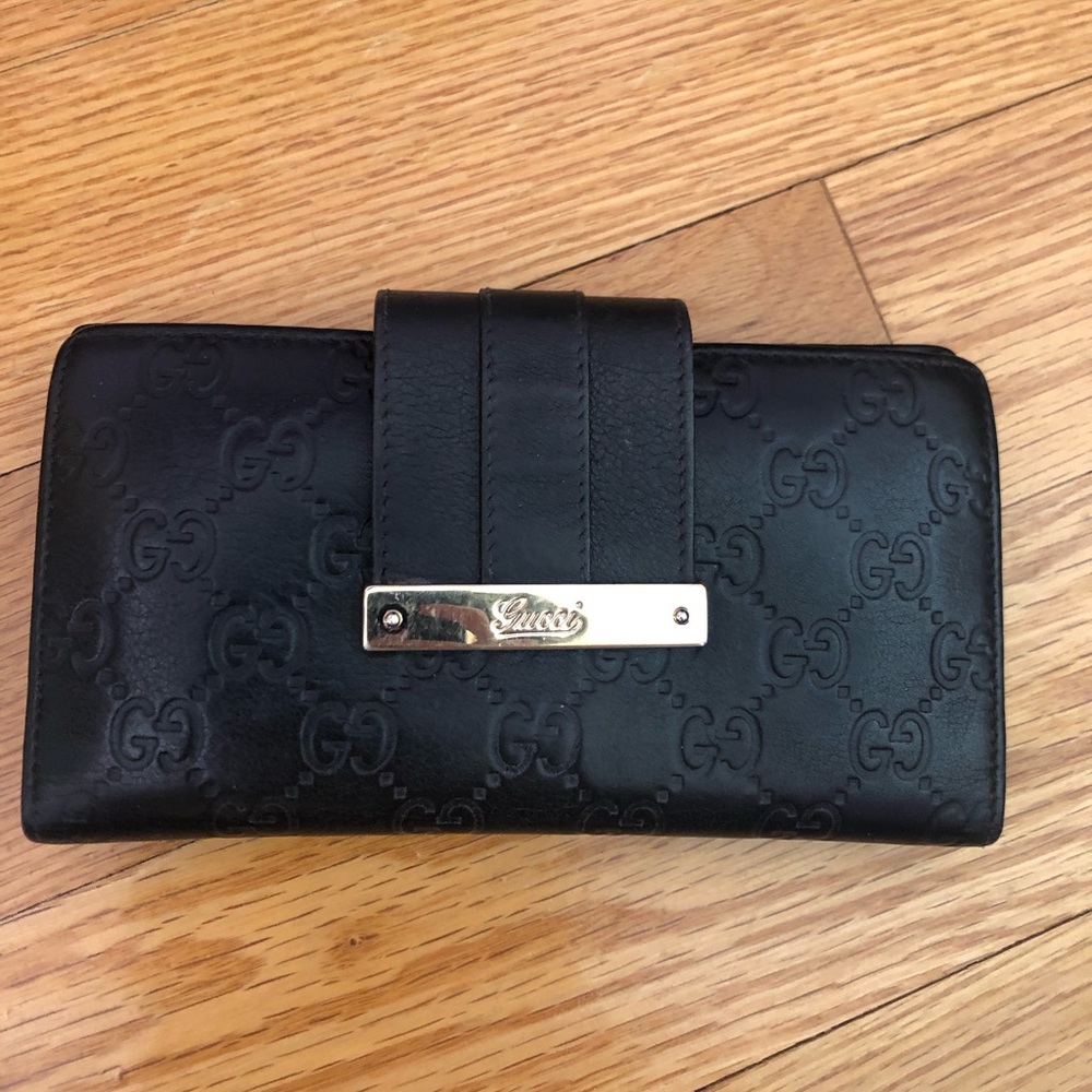Leather black Gucci GG flap wallet